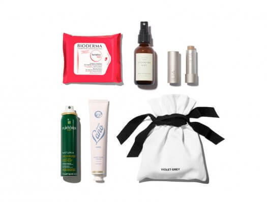 Breeze through airport security with these carry-on essentials, all travel-friendly and under 3.4 ounces. Set includes: Lanolips Rose Hand Cream Intense Bioderma Sensibio H20 Wipes René Furterer NaturiaDry Shampoo In Travel Size True Botanicals Hydrating Mist Ilia Balmy Nights VIOLET GREY duster bag